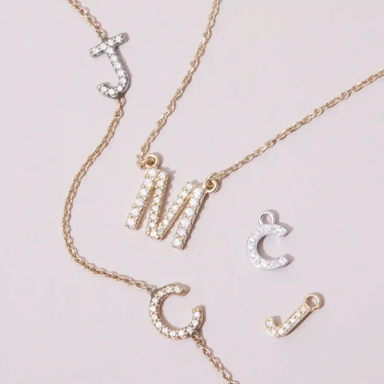 Layered initial necklaces with multiple letters for personalized style