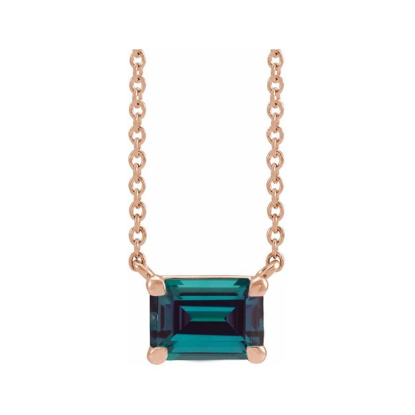 Emerald-cut alexandrite birthstone necklace set in 14K rose gold with vertical minimalist pendant design
