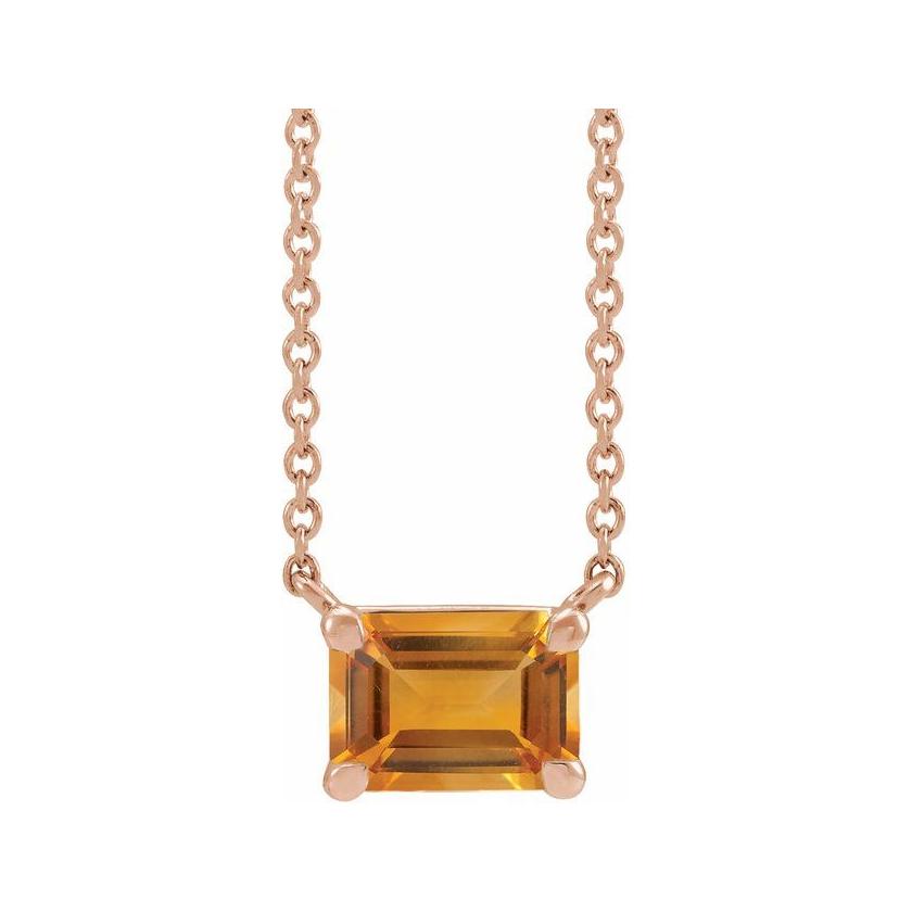 Modern 14K rose gold necklace featuring vertical emerald-cut citrine gemstone for birth month elegance