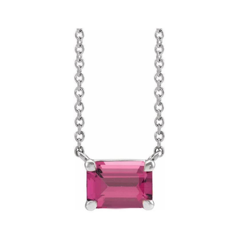 Emerald-cut tourmaline birthstone necklace set in 14K yellow gold with vertical minimalist pendant design