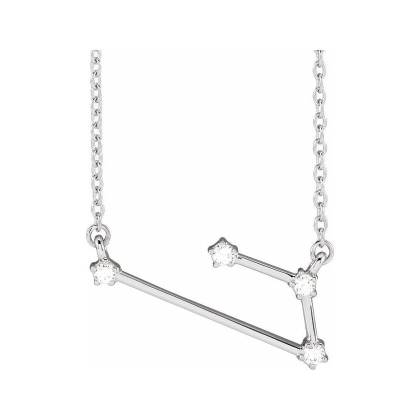 Minimalist Aries necklace featuring pave diamond constellation in solid gold