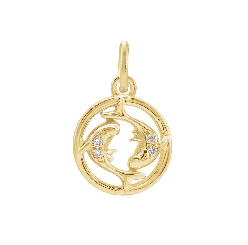 Delicate Pisces astrology charm featuring tiny diamonds and gold