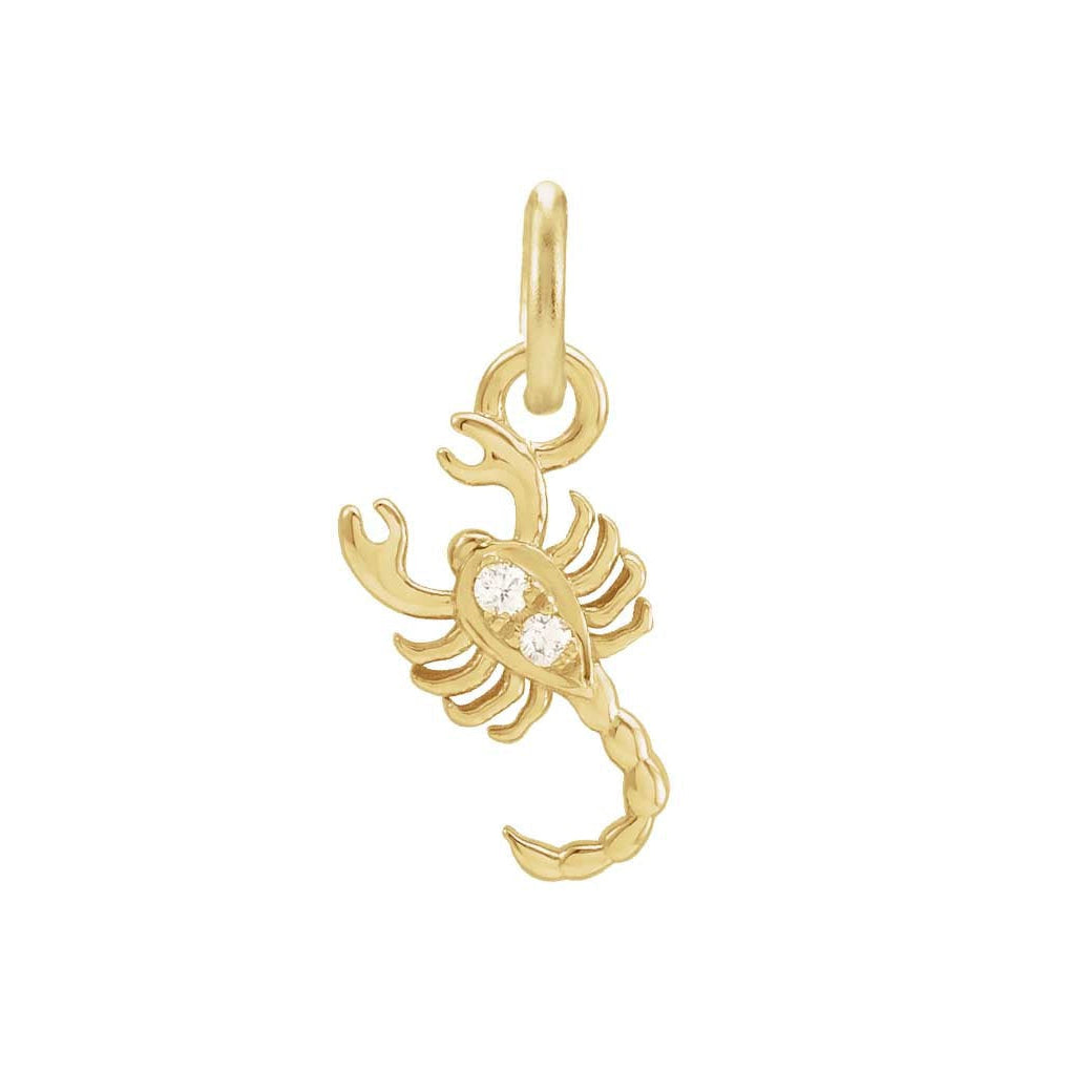 Delicate Scorpio astrology charm featuring tiny diamonds and gold