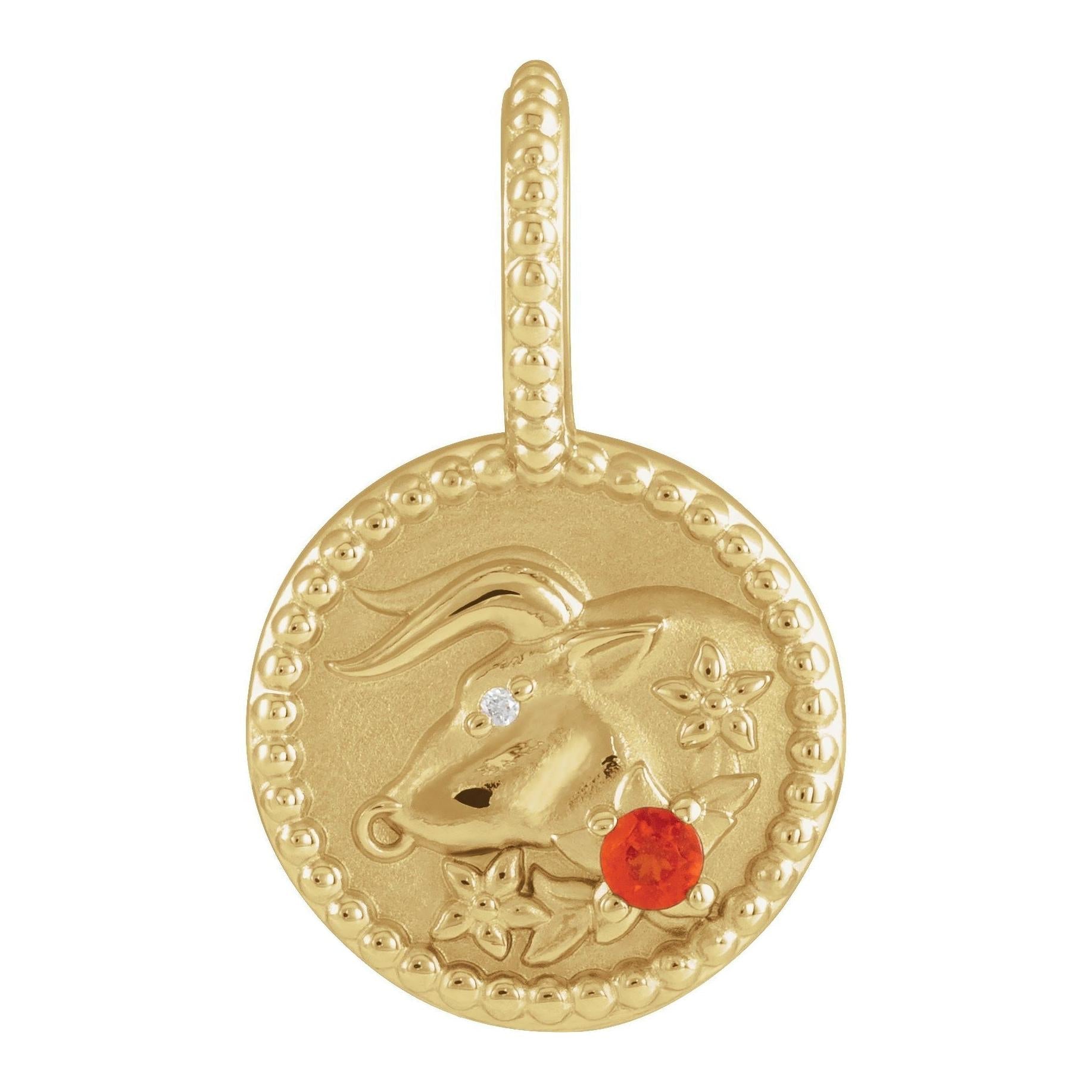 Polished 14K yellow gold coin charm featuring detailed Taurus zodiac engraving.