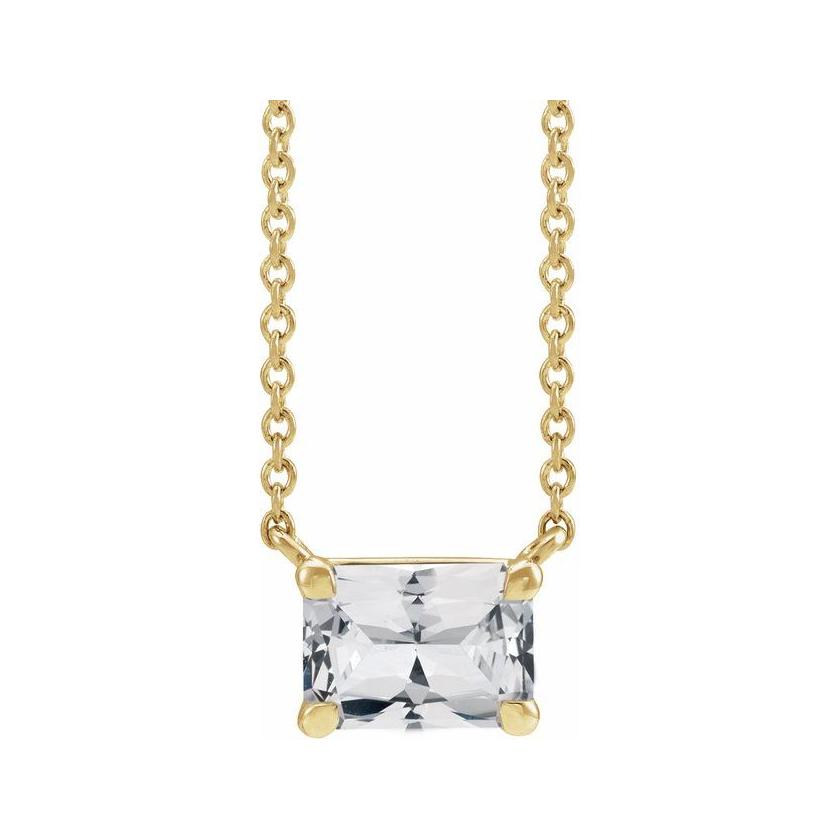 Elegant emerald-cut white sapphire pendant in 14K white gold—refined birthstone necklace with timeless appeal