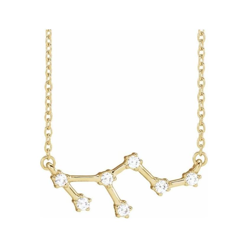 Leo diamond zodiac necklace in 14K gold with celestial charm design