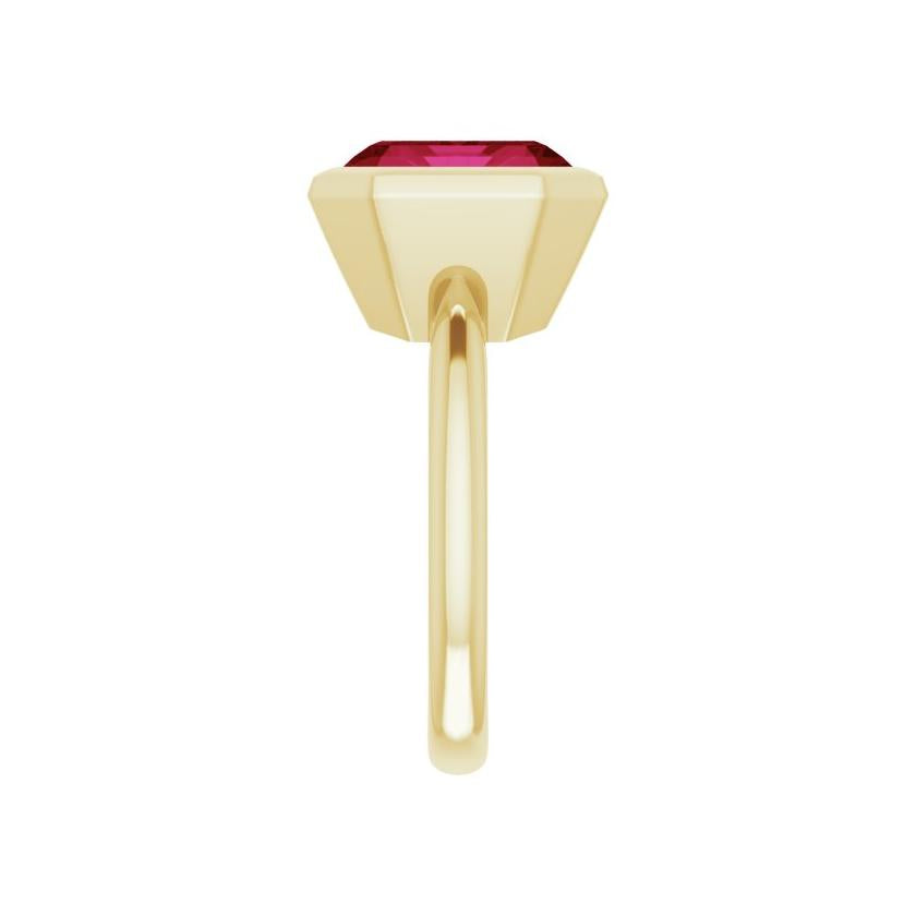 Ruby cocktail ring featuring horizontal 8.37 CT lab-created emerald cut stone