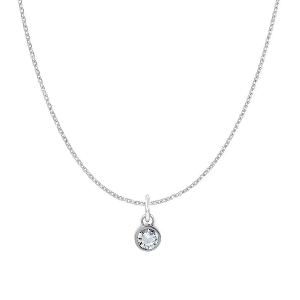 Natural diamond birthstone charm necklace in 14K white gold, bezel-set pendant on cable chain, product shot