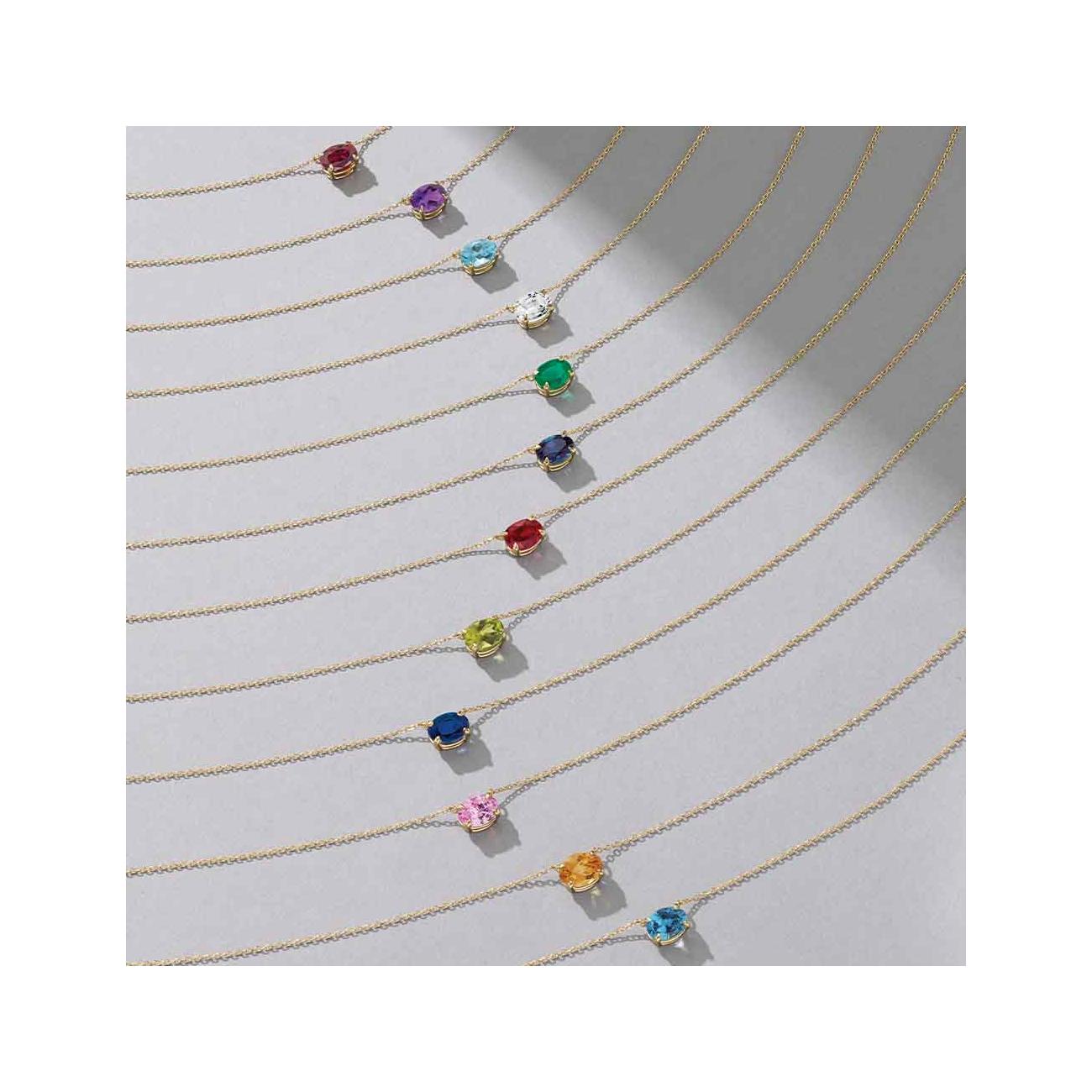 East West Oval Birthstone Necklace shown in all 12 birthstone stone options.