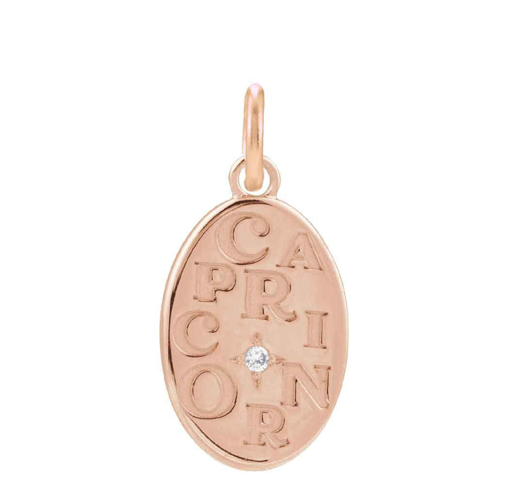 Modern zodiac necklace charm with deeply engraved Capricorn sign in 14K rose gold