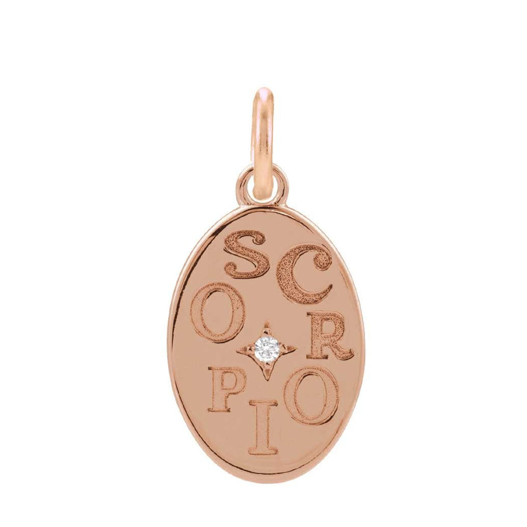 Minimalist Scorpio zodiac charm engraved in 14K yellow gold, perfect for layered necklaces