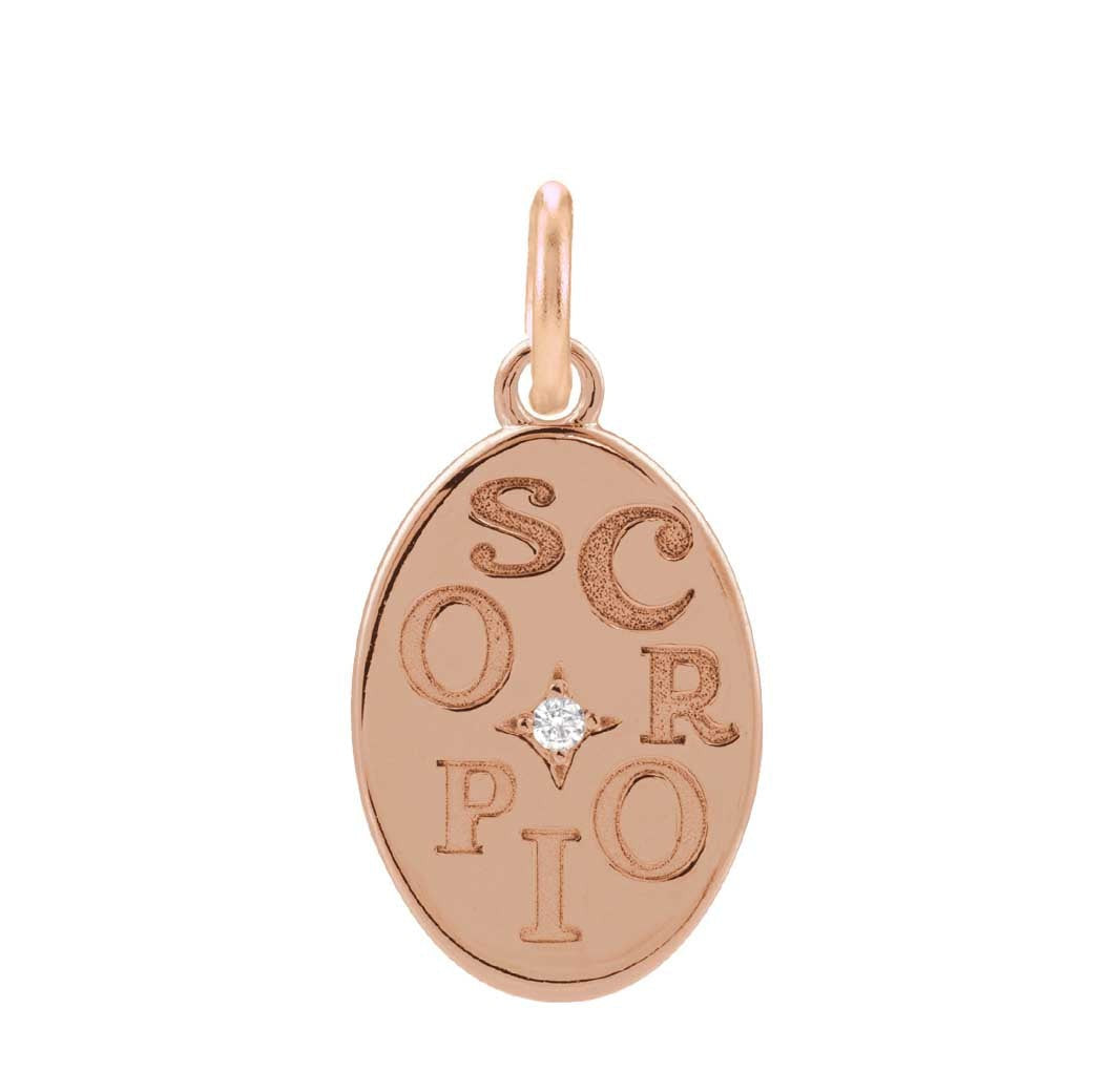 Minimalist Scorpio zodiac charm engraved in 14K yellow gold, perfect for layered necklaces