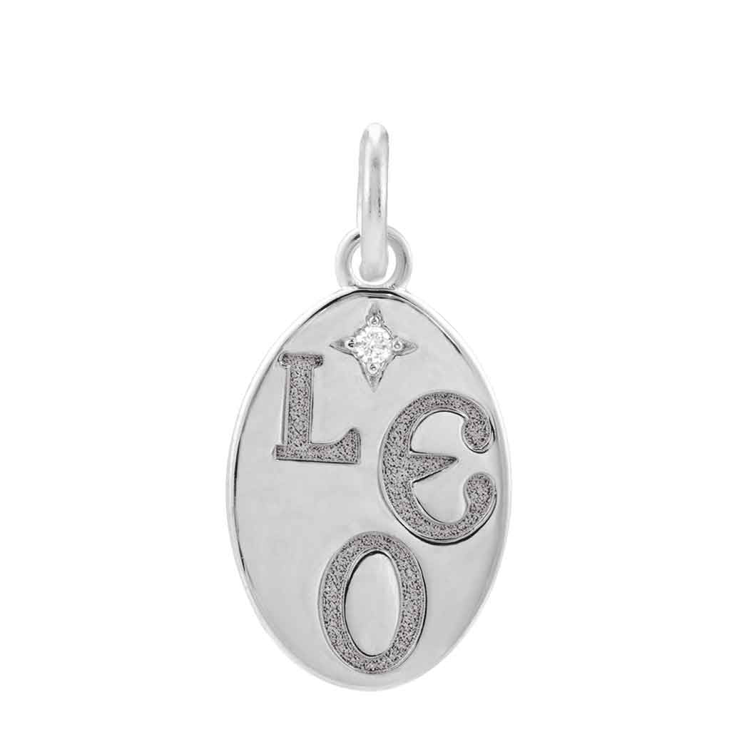 Delicate Leo zodiac emblem engraved into a flat 14K white gold coin pendant