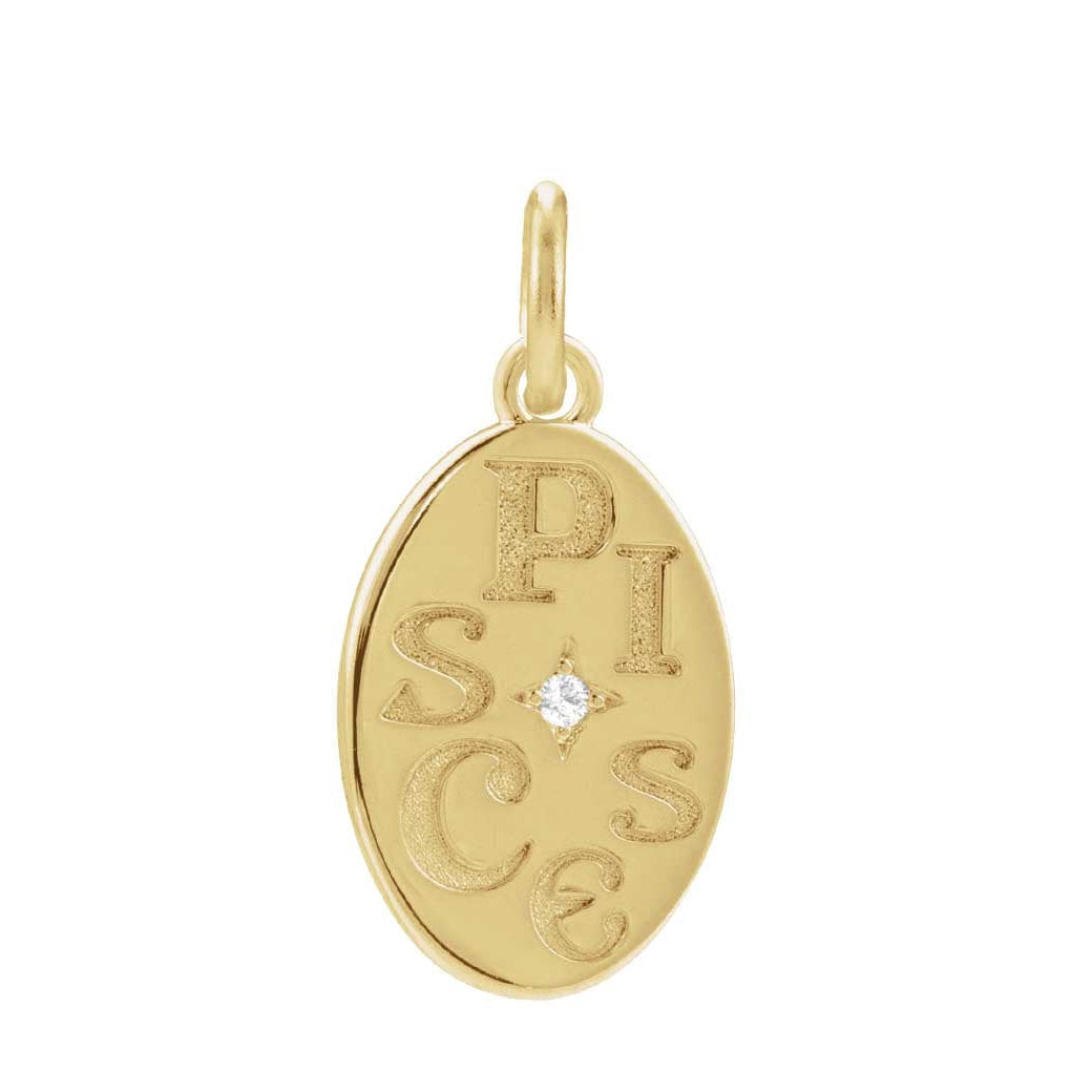 Hand-finished round zodiac charm in 14K yellow gold, engraved with the sign of Pisces