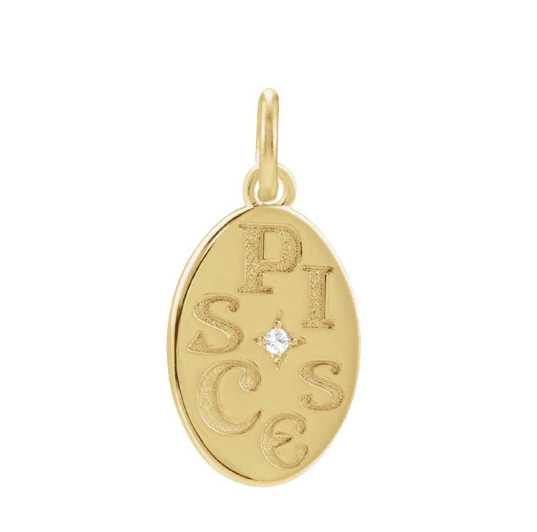 Hand-finished round zodiac charm in 14K yellow gold, engraved with the sign of Pisces