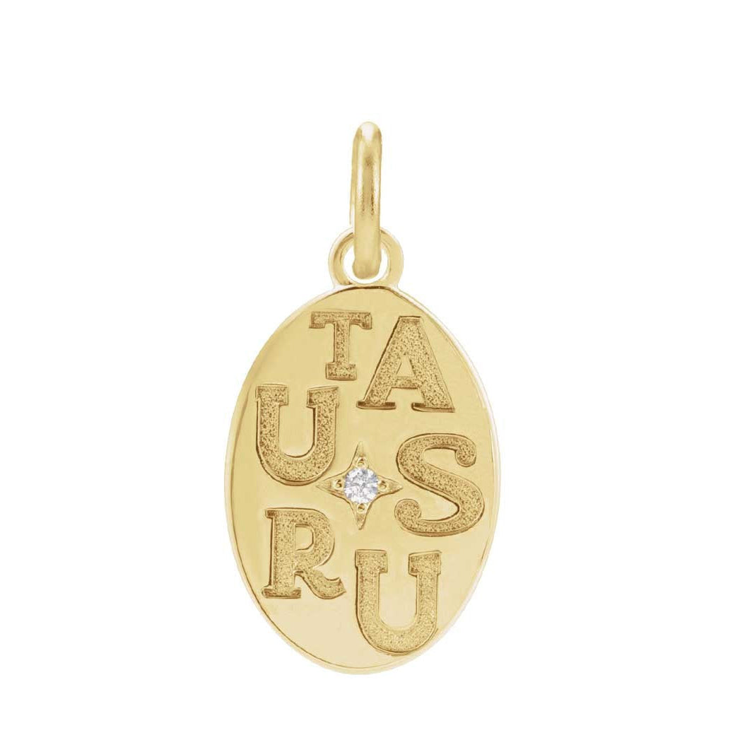 Modern zodiac necklace charm with deeply engraved Taurus sign in 14K white gold