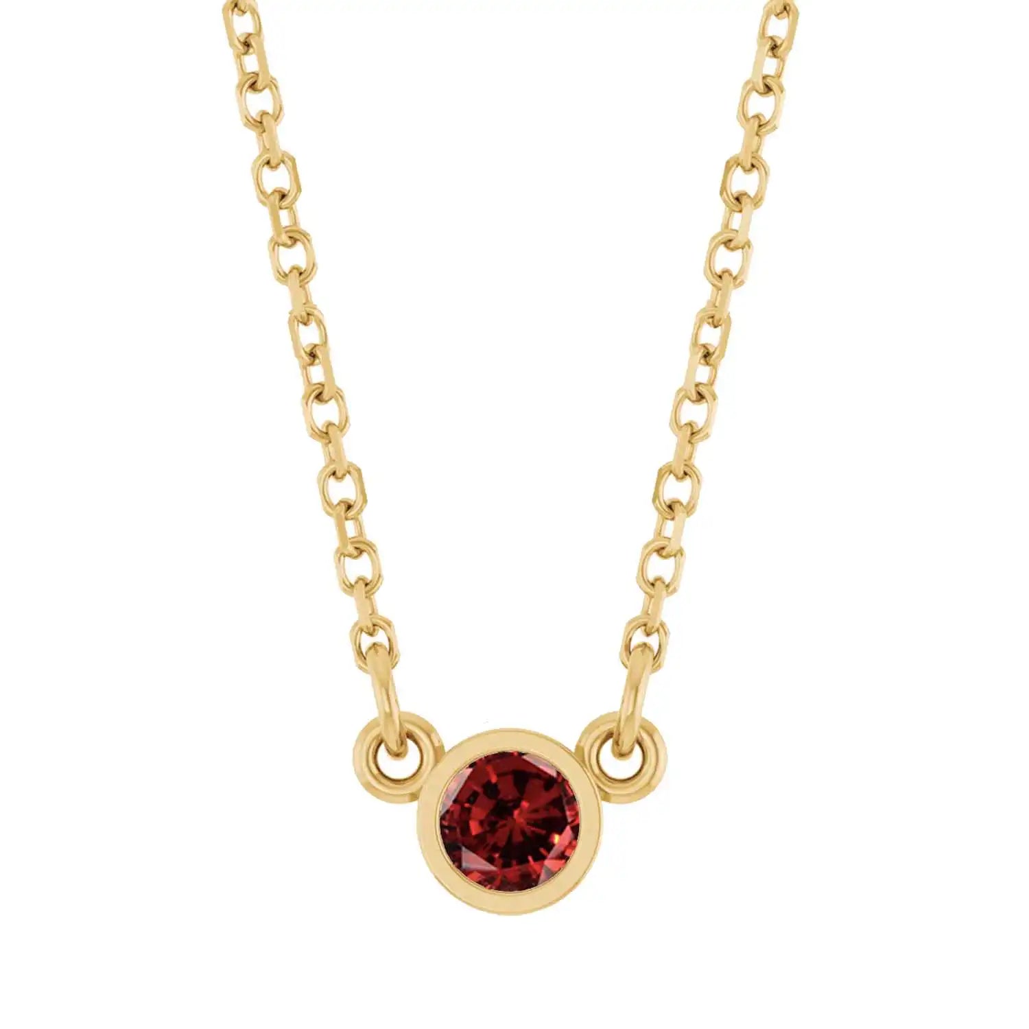 Bezel-set garnet birthstone necklace in 14K yellow gold, product view variant--14K rose gold