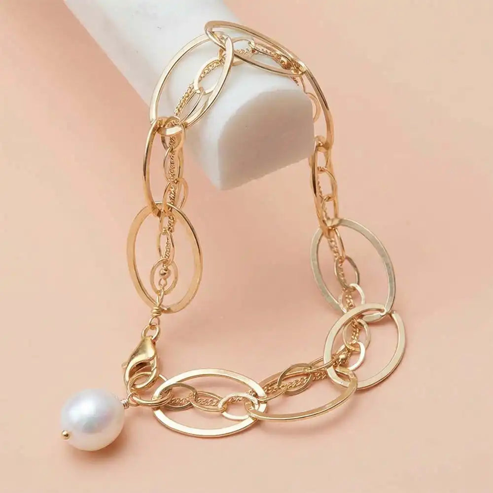 Natural pearl woven chain bracelet in sterling silver, styled on chain necklace variant--Gold-fill variant--Sterling-silver variant--Pearl