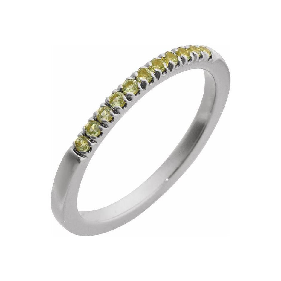 Delicate 14K white gold birthstone ring showcasing a sparkling peridot accent.