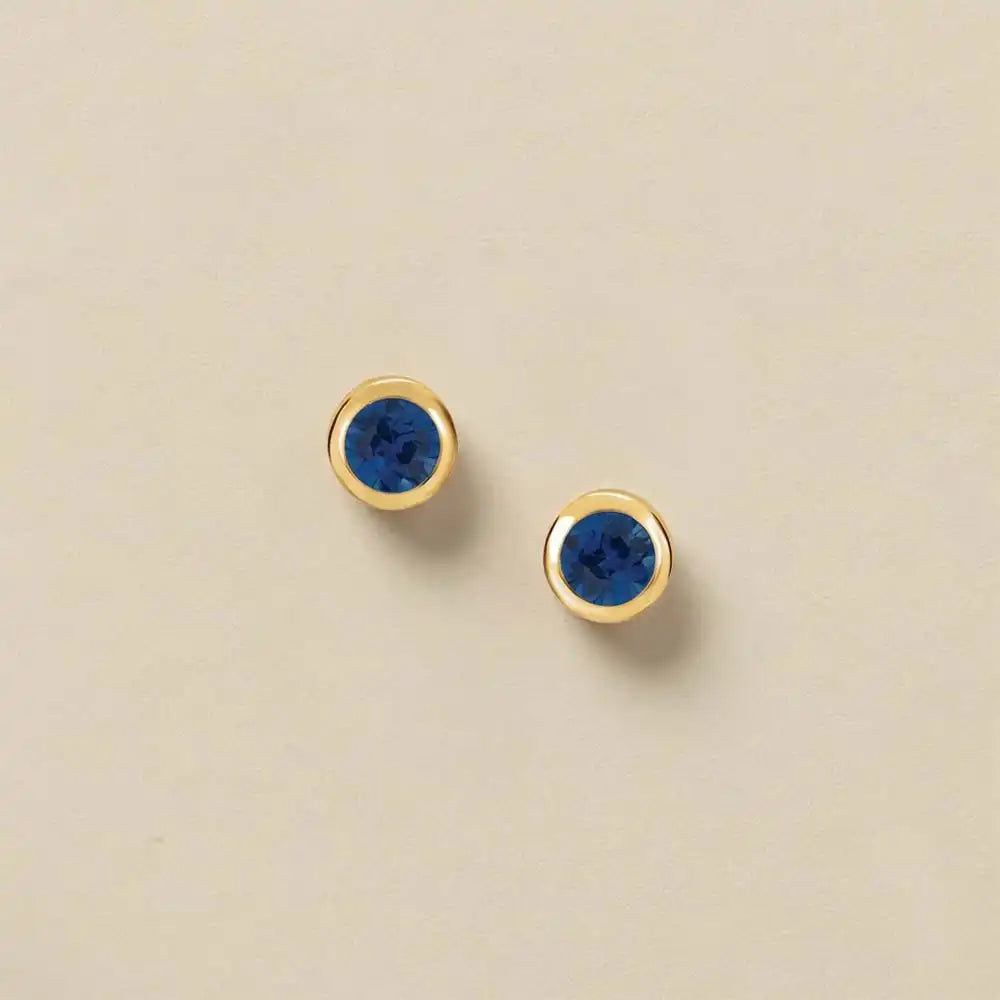 Sapphire stud earrings in 14K gold, 4mm genuine sapphire, product shot variant--Sterling silver