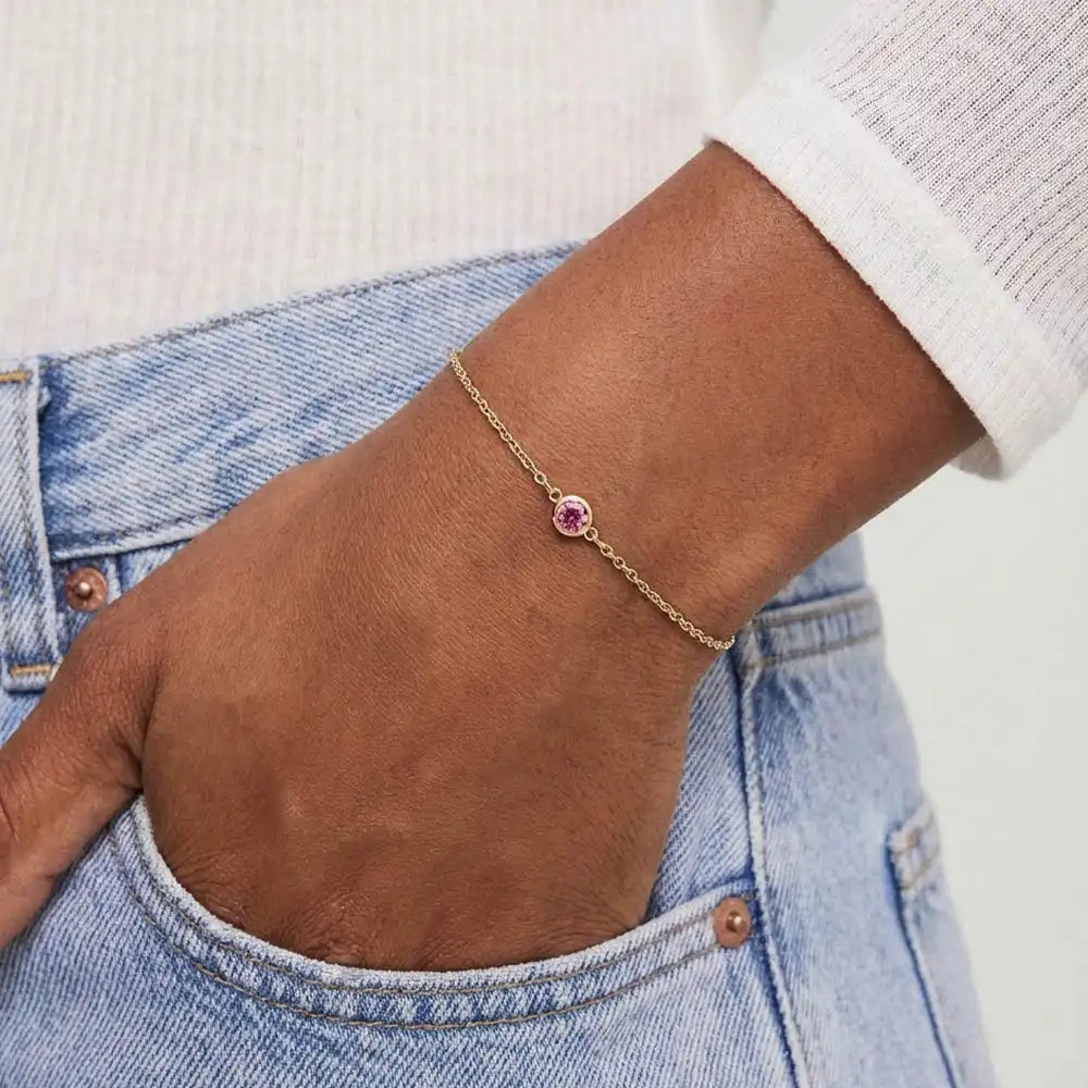 Model wearing bezel-set tourmaline bracelet variant--14K-yellow-gold variant--Tourmaline