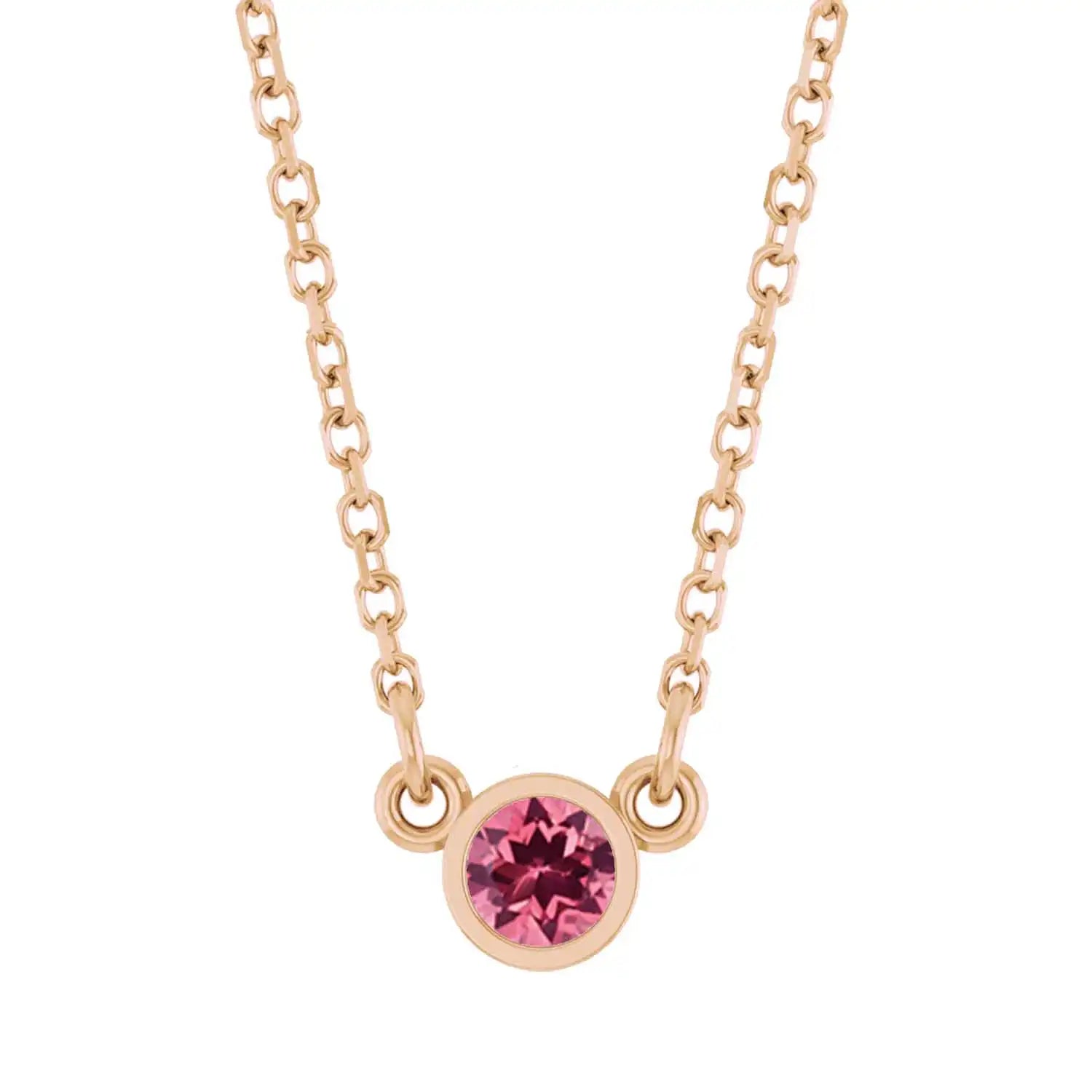 Bezel-set pink tourmaline birthstone necklace in 14K rose gold, product view variant--14K-rose-gold variant--Tourmaline