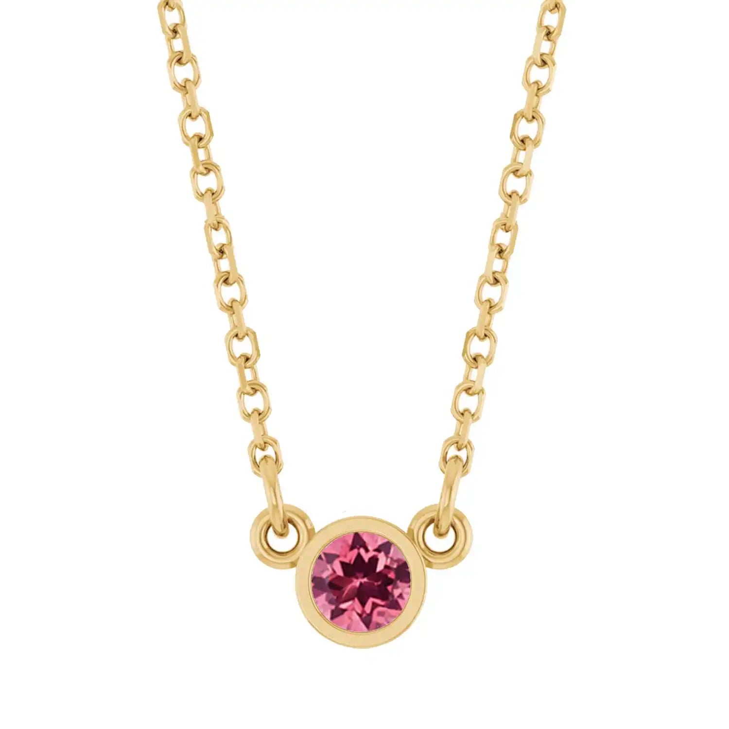 Bezel-set pink tourmaline birthstone necklace in 14K yellow gold, product view variant--14K-yellow-gold variant--Tourmaline