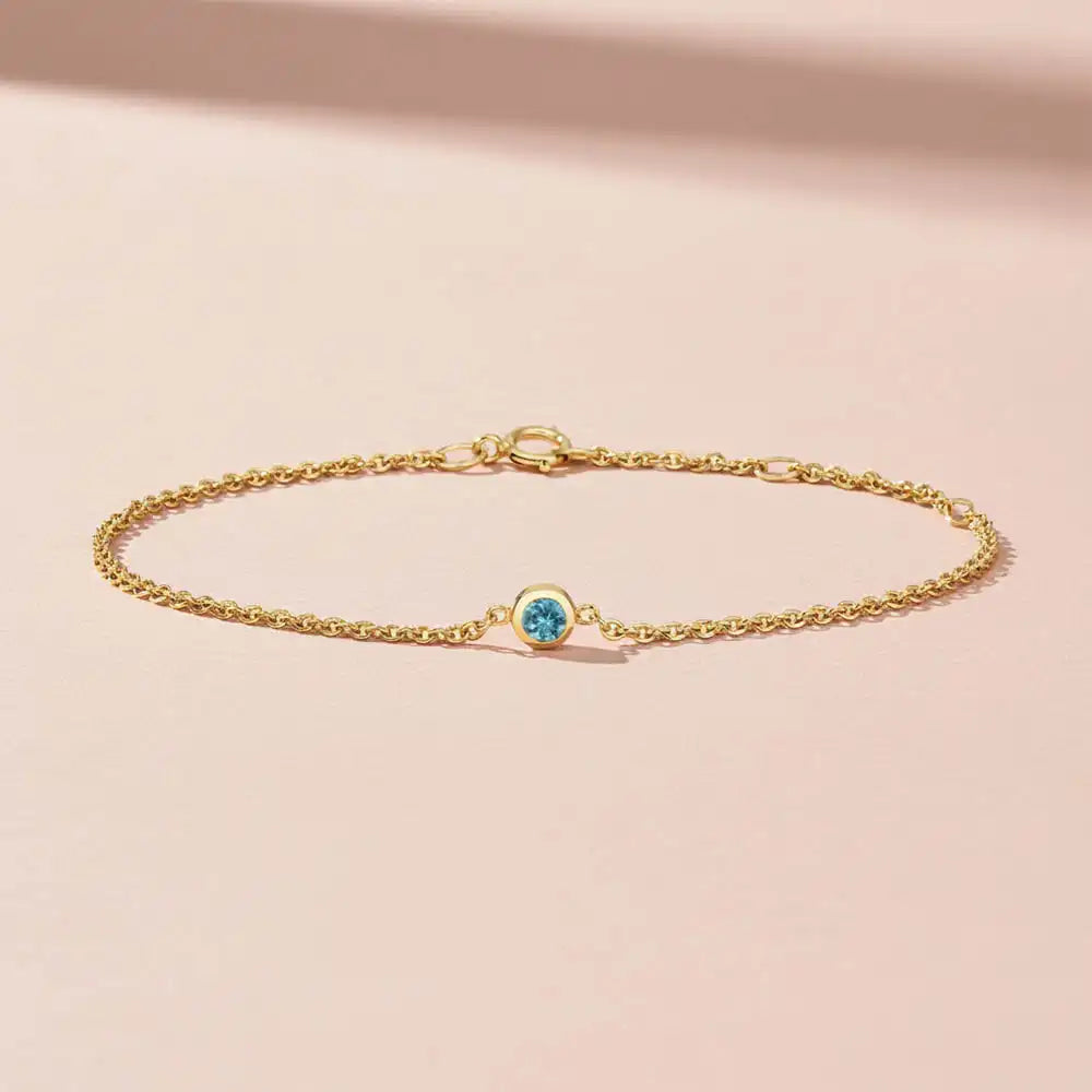 Minimalist bezel-set zircon bracelet for stacking variant--14K-yellow-gold variant--Zircon