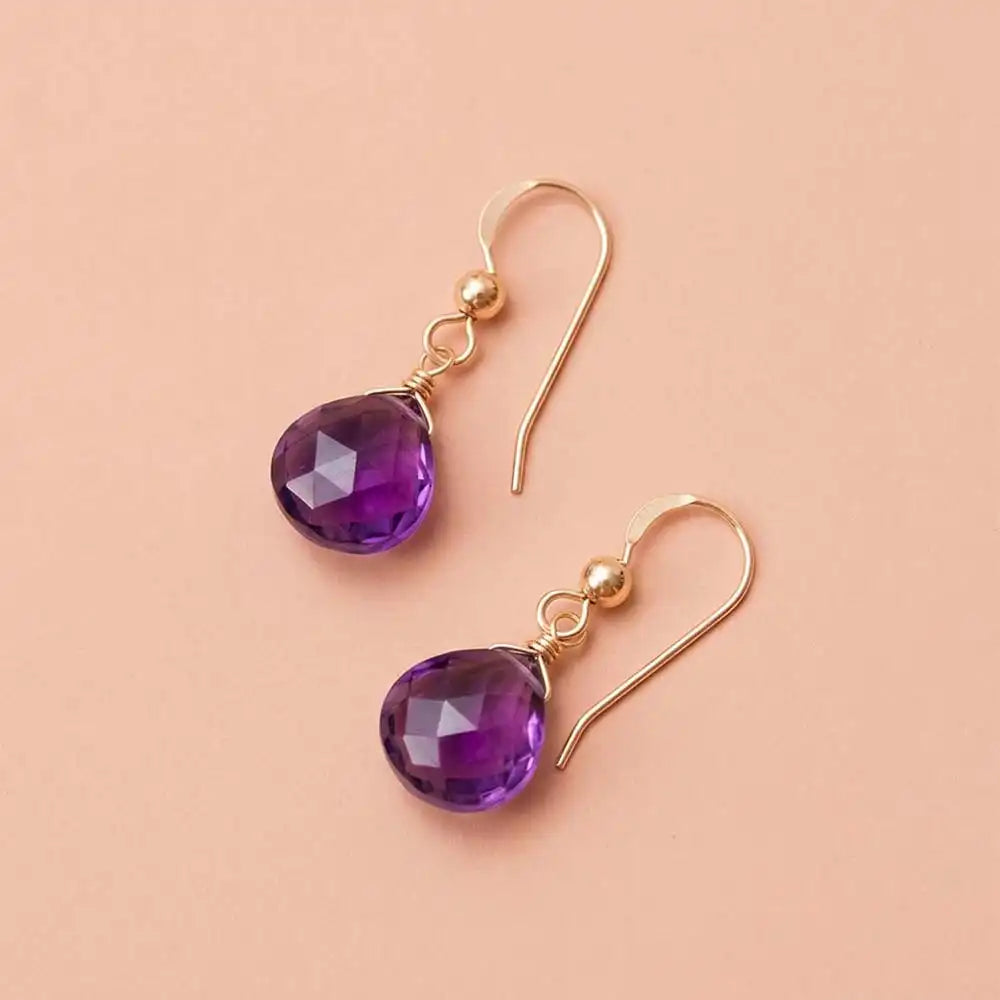 Amethyst drop earring on gold hooks variant--Gold-fill, variant--Sterling-silver, variant--14K-yellow-gold, variant--14K-white-gold variant--Amethyst