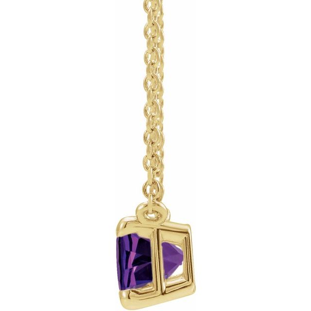 Close-up of 5x3mm amethyst gemstone in prong setting on cable chain