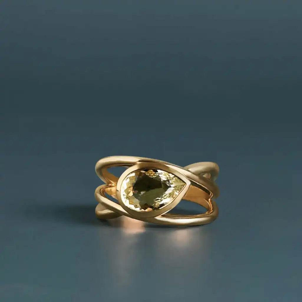 Criss-cross sculptural aquamarine cocktail ring 10K gold