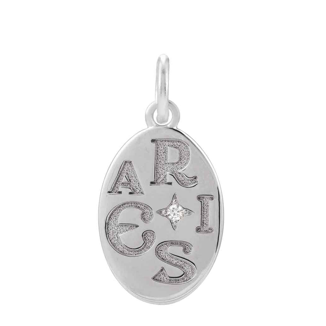 Hand-engraved Aries disc in 14K white gold, designed for personalized astrological jewelry