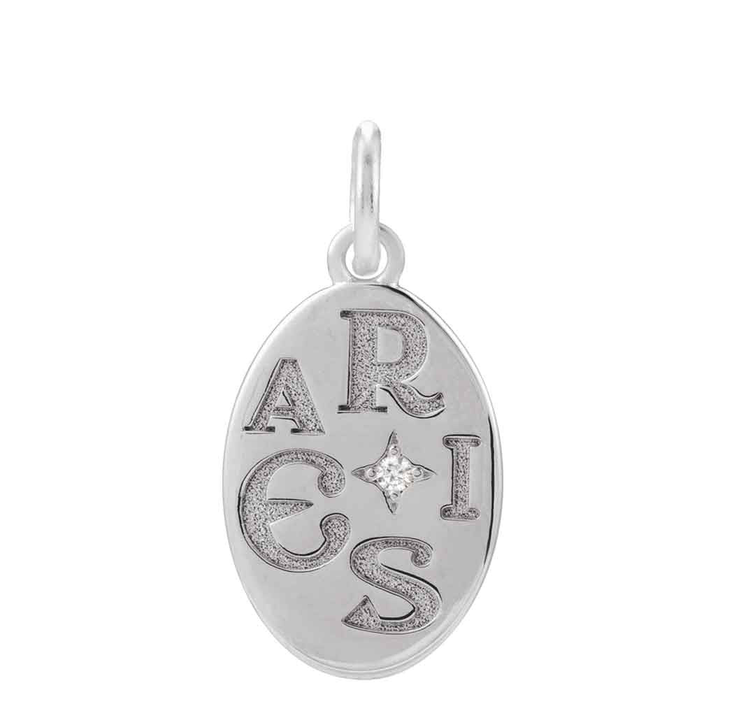 Hand-engraved Aries disc in 14K white gold, designed for personalized astrological jewelry
