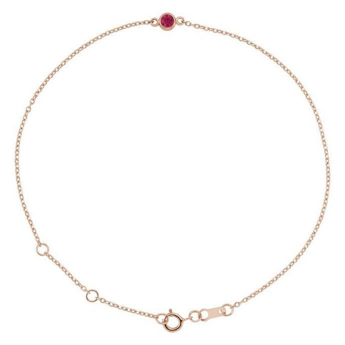 Bezel-set ruby bracelet in 14K gold