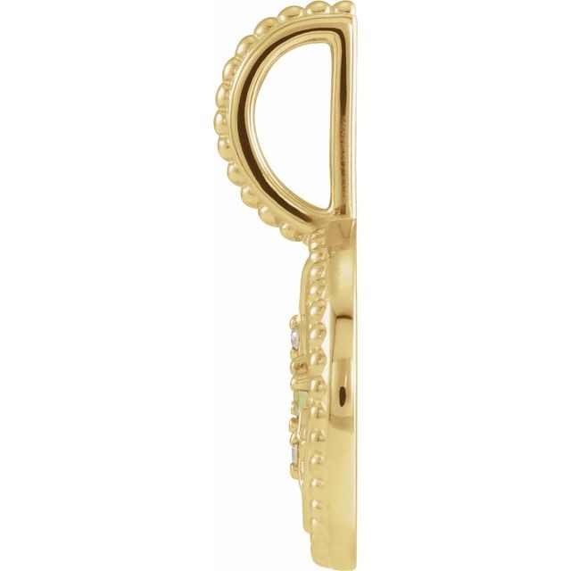 Textured gold Gemini zodiac charm with bright green peridot side view