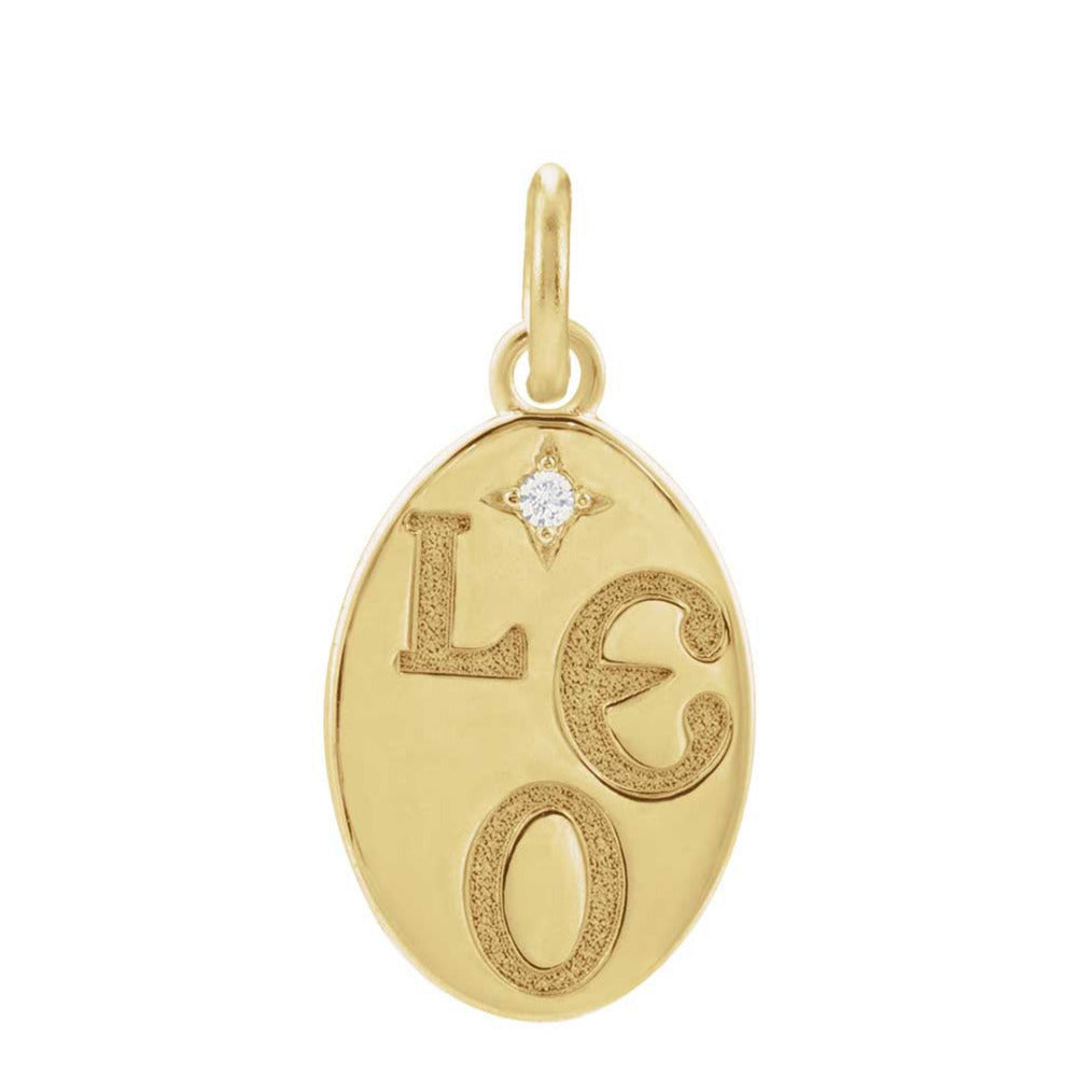 Flush-set natural diamond detail on Leo charm in yellow gold