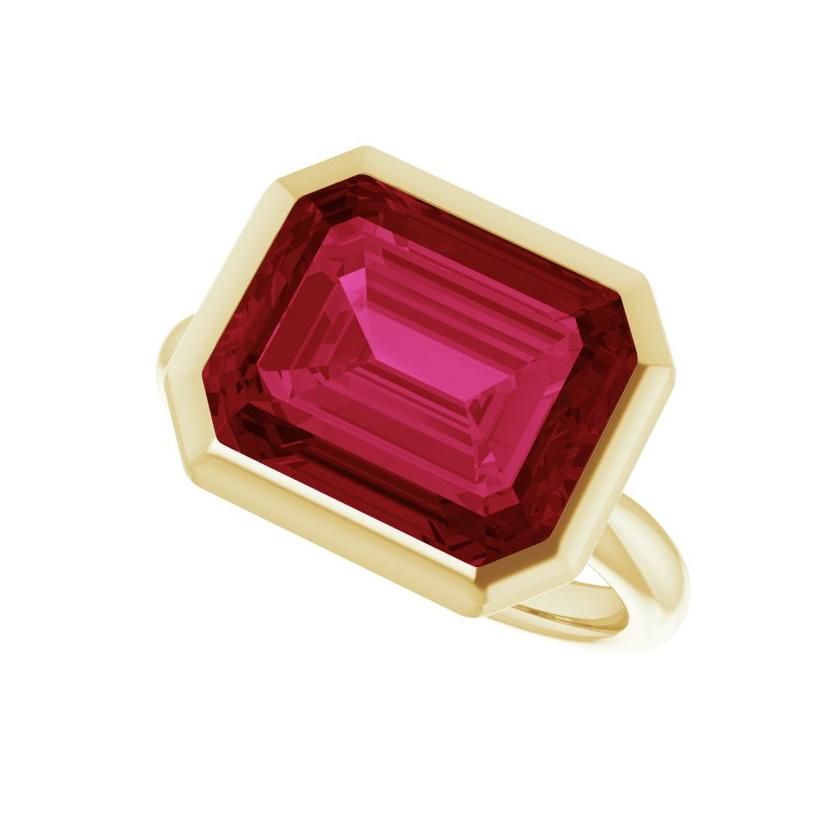 East-west emerald-cut ruby ring in 10K yellow gold, handmade and sustainable