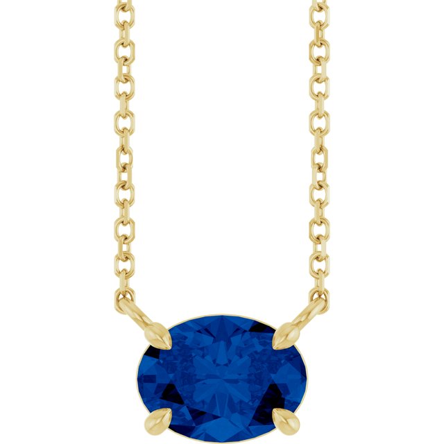 East-west sapphire necklace in 14K yellow gold for September birthstone