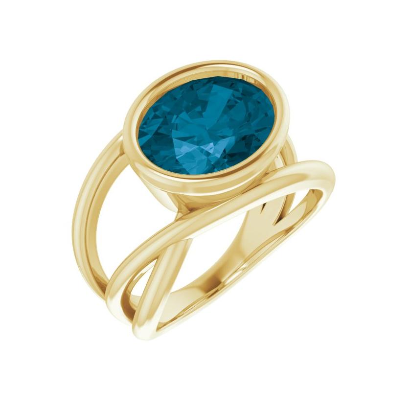 Architectural criss-cross gold ring with London Blue Topaz