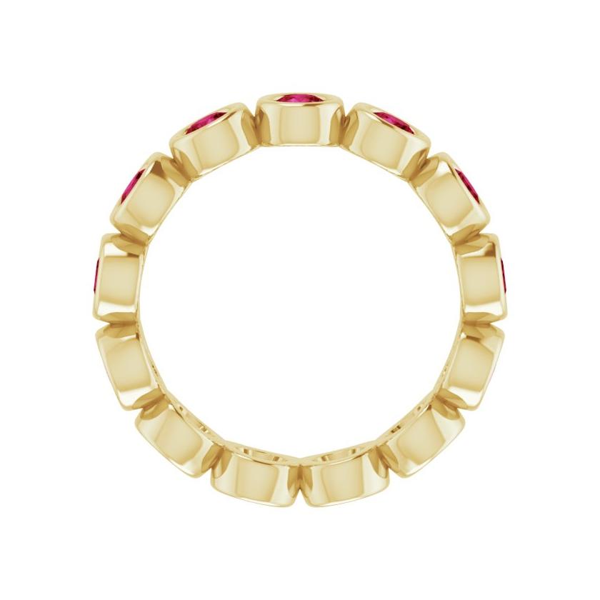 Lab-grown ruby eternity ring in yellow gold, handcrafted and eco-friendly