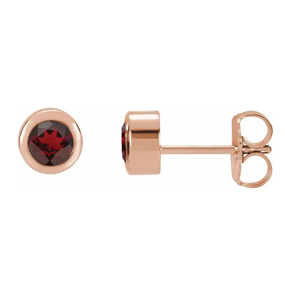 Garnet bezel stud earrings side view in 14K rose gold variant--14K-rose-gold variant--Garnet