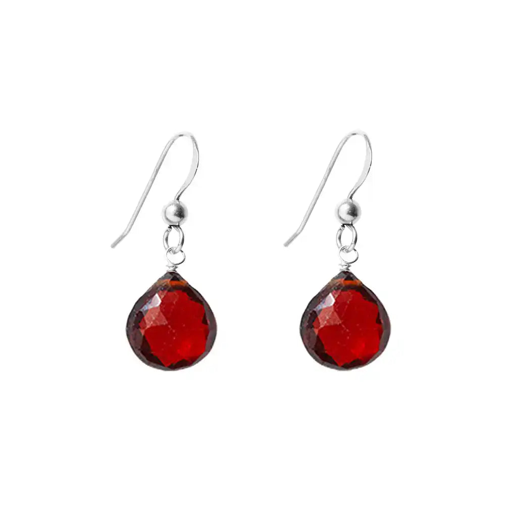 White gold garnet earrings with a deep red gemstone