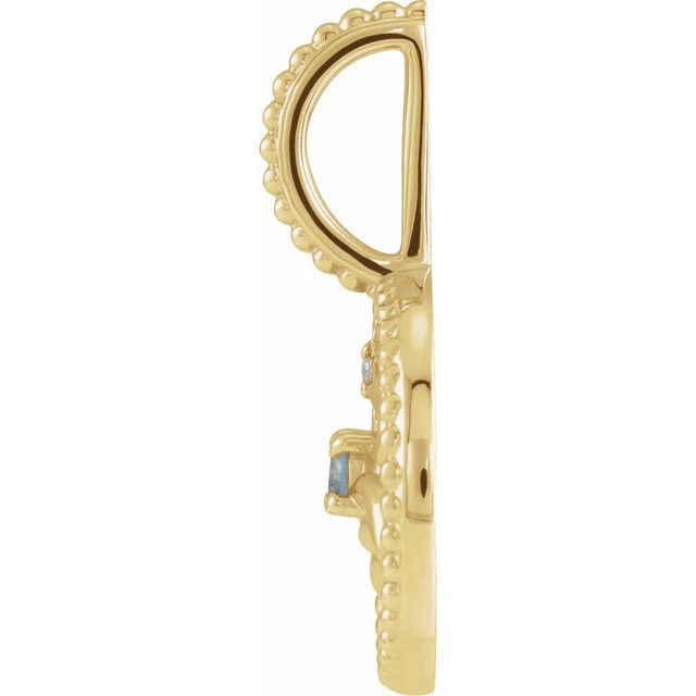 gold cancer charm close-up side-view of pendant