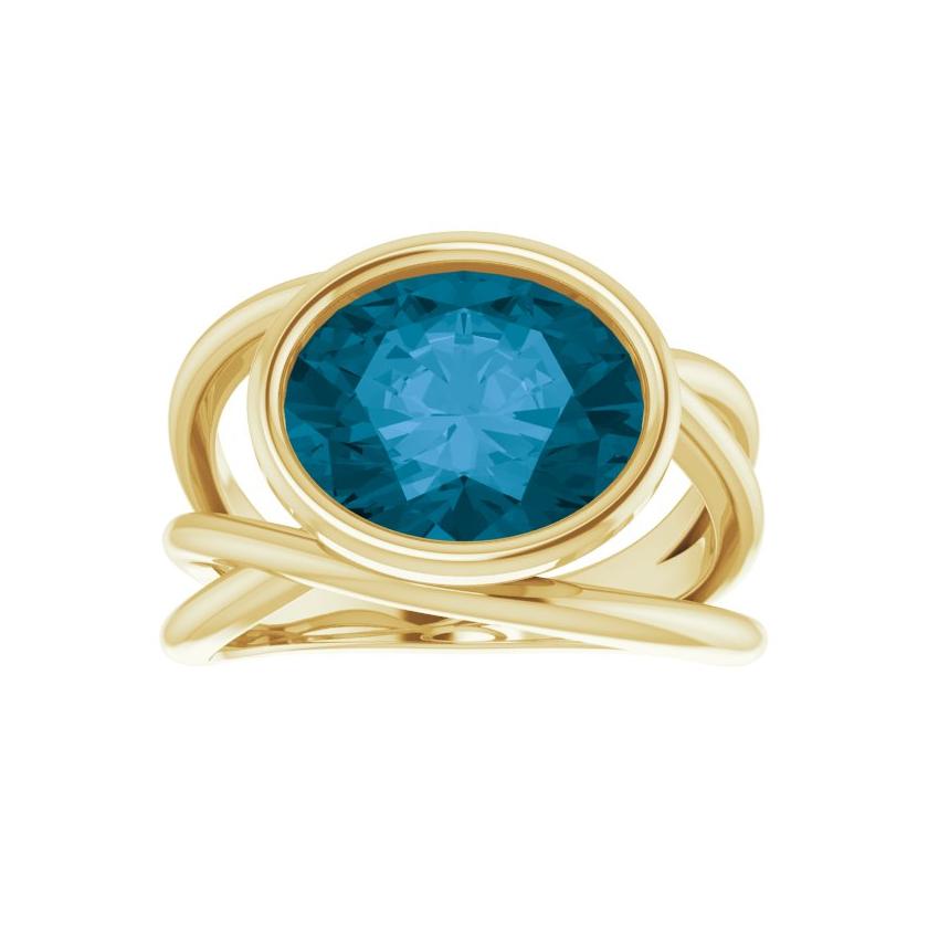 Eco-conscious London Blue Topaz cocktail ring