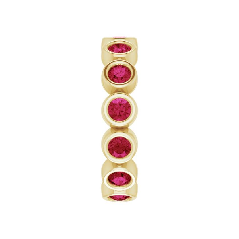 Sustainable ruby band with round stones in 10K gold, perfect for stacking