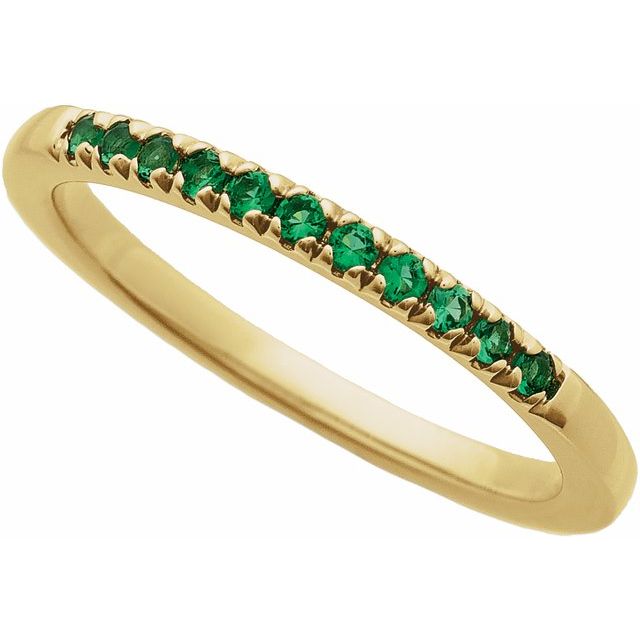May birthstone ring with vivid green emeralds in yellow gold