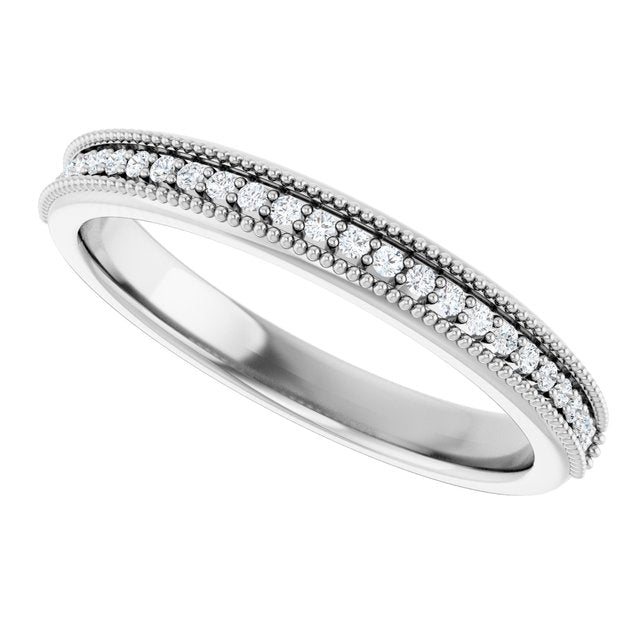 Angled white gold band showing bead detail and prong settings
