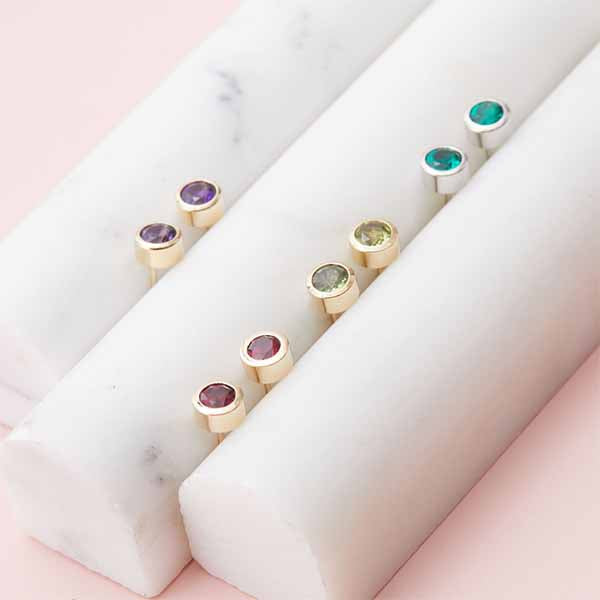 Birthstone bezel-set stud earrings in several birthstones perfect for a birthday