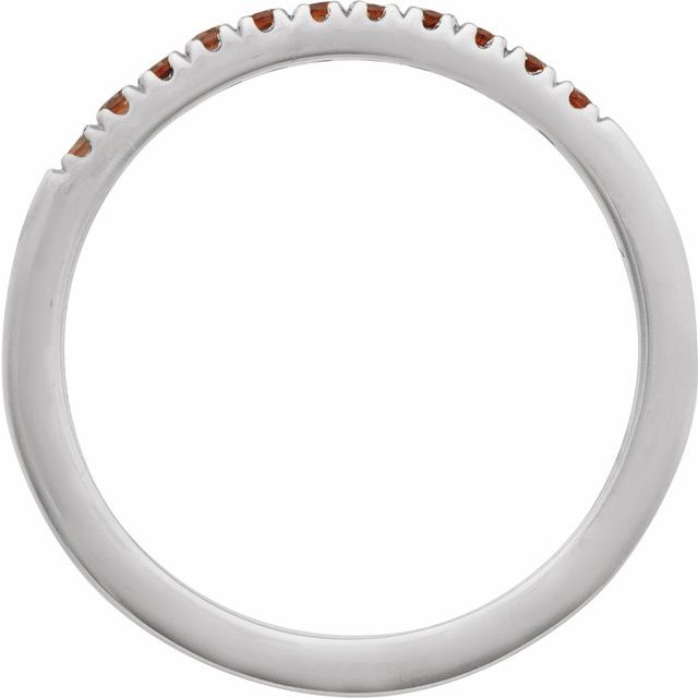 White gold stacking ring with deep red garnets detail view