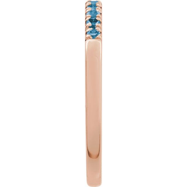 Minimalist stacking band in rose gold with eleven topaz gems